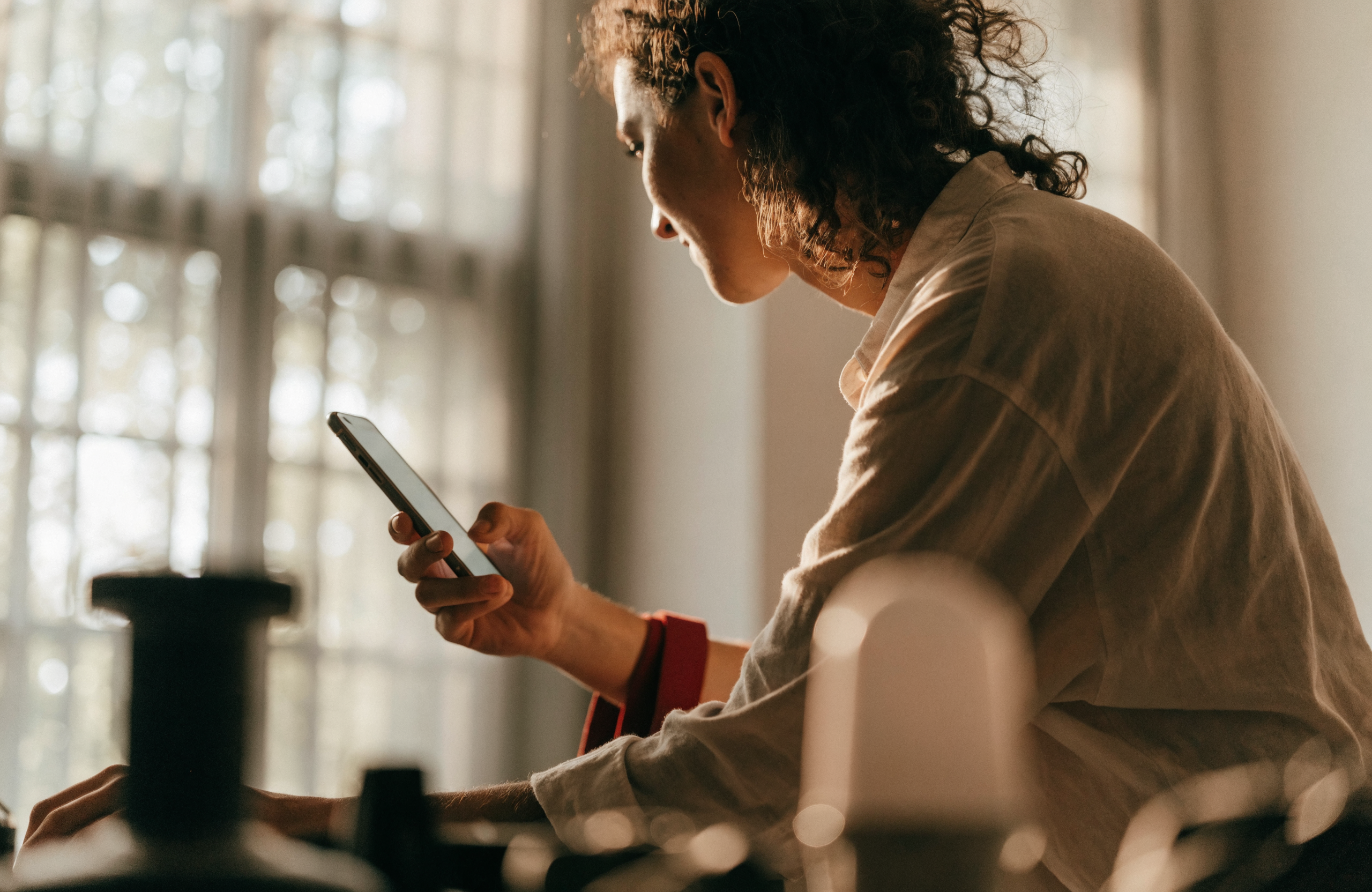 A professional checking a reminder on their phone